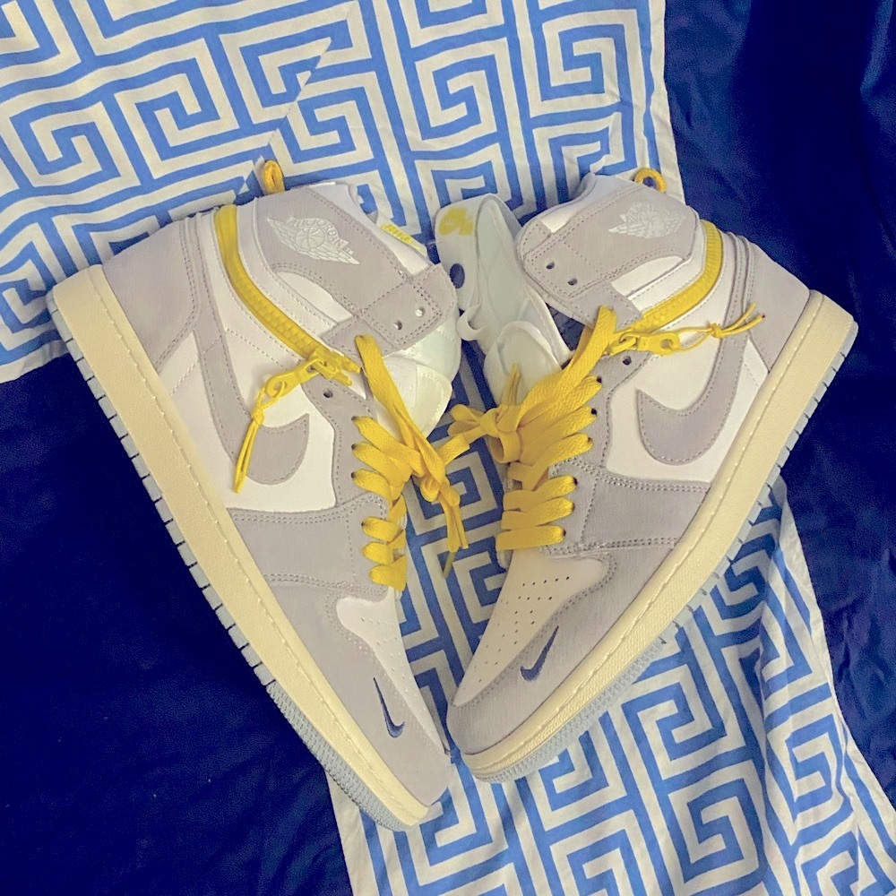 Gray and Yellow High-Top Jordan 1’s